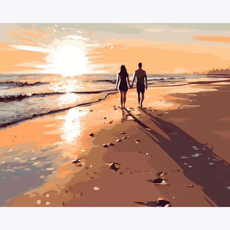 Silhouette of a couple holding hands on a beach at sunset