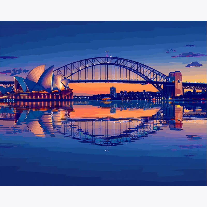 Sydney Harbour Bridge and Opera House at sunset with reflection on water