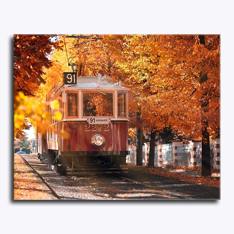 Painting of a red trolley on tracks with autumn trees in the background
