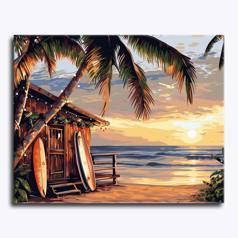 Christmas tropical beach scene with wooden hut, surfboards, and palm trees during sunset.