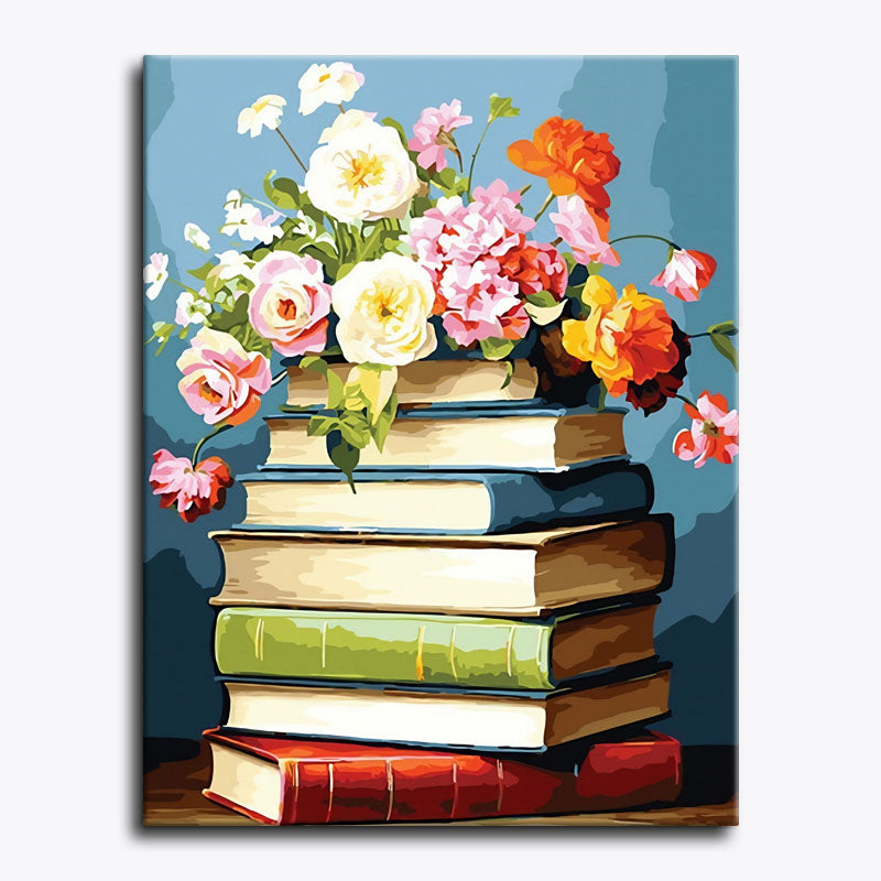 Stack of books with flowers on a blue background