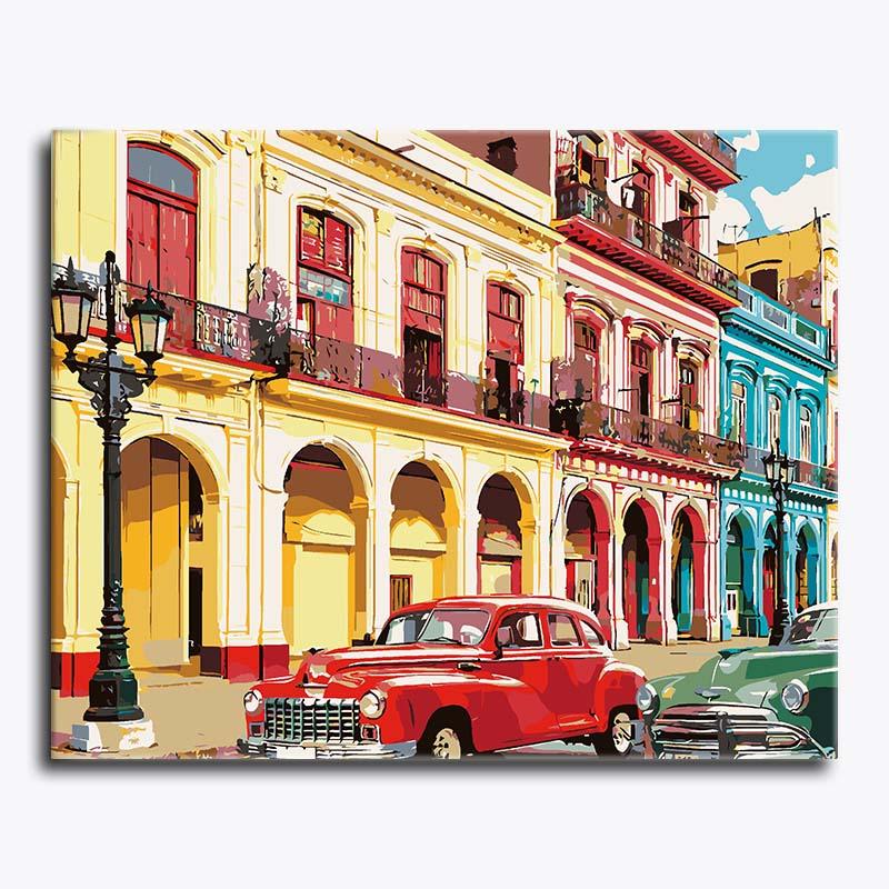 Colorful street scene with vintage cars and buildings