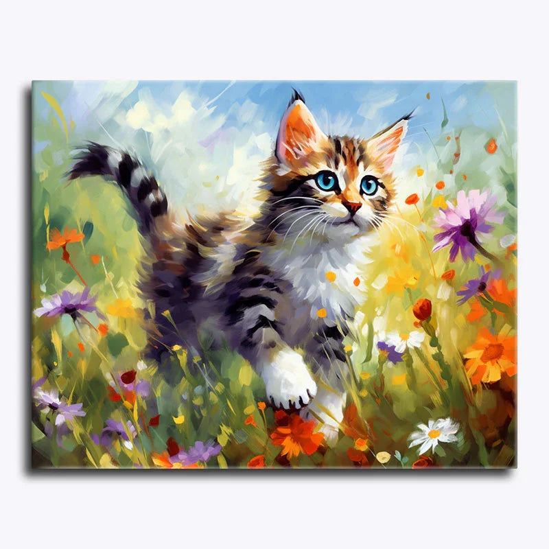 Painting of a kitten in a field of flowers