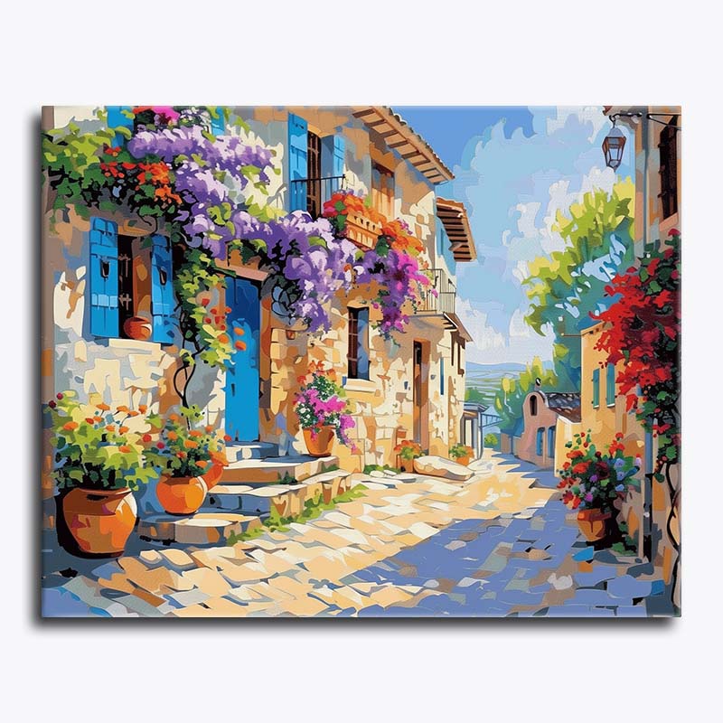 Colorful painting of a Mediterranean street with flowers and buildings.