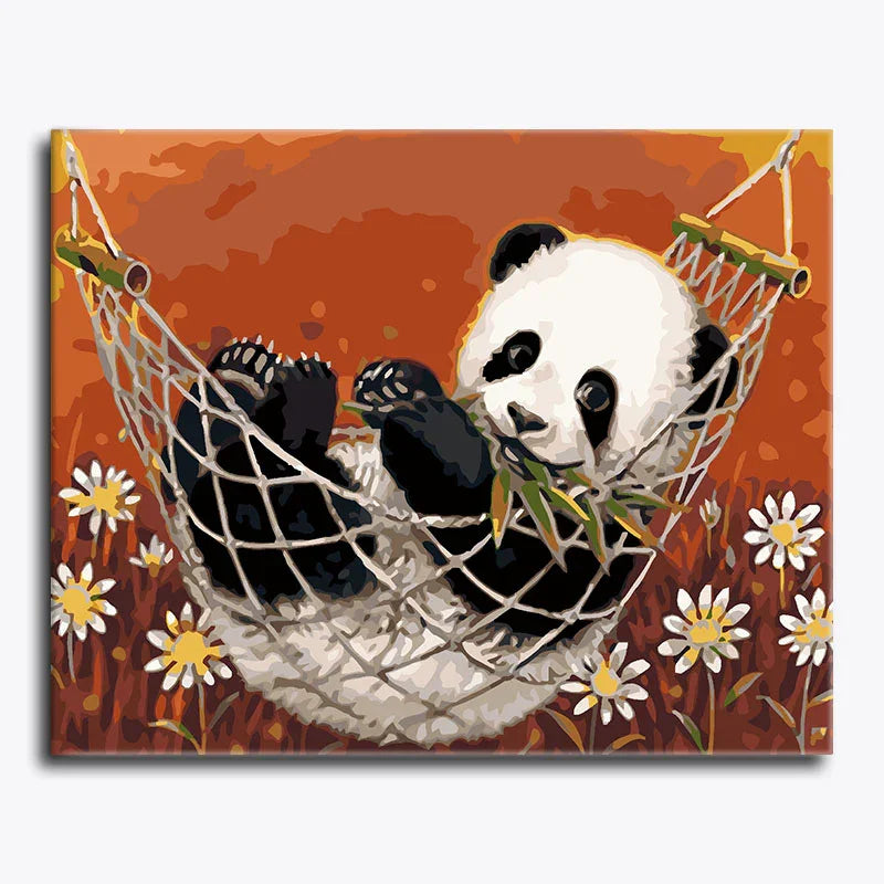 Panda bear in a hammock with flowers on an orange background