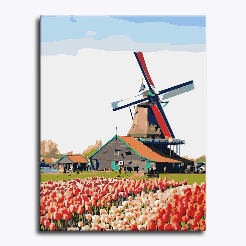 Canvas print of a windmill and tulip field with a blue sky.