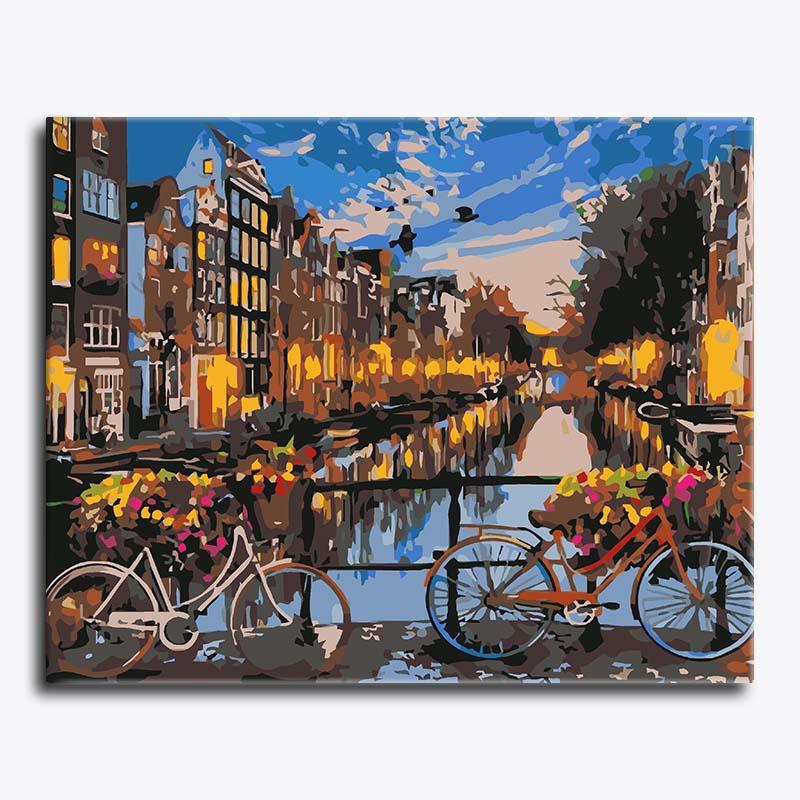 Painting of a city scene with bicycles and flowers by a canal
