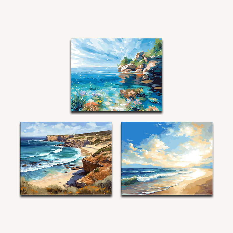 Set of three coastal landscape paintings on a white background