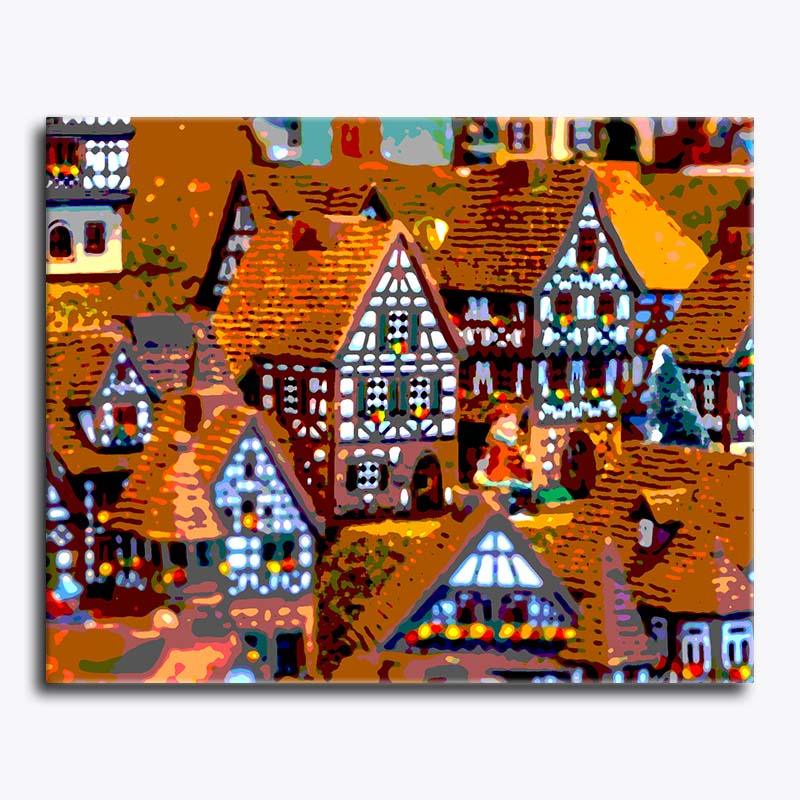Colorful painting of a village scene with houses and lights