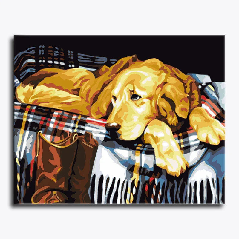 Painting of a dog lying on a plaid blanket with a black border
