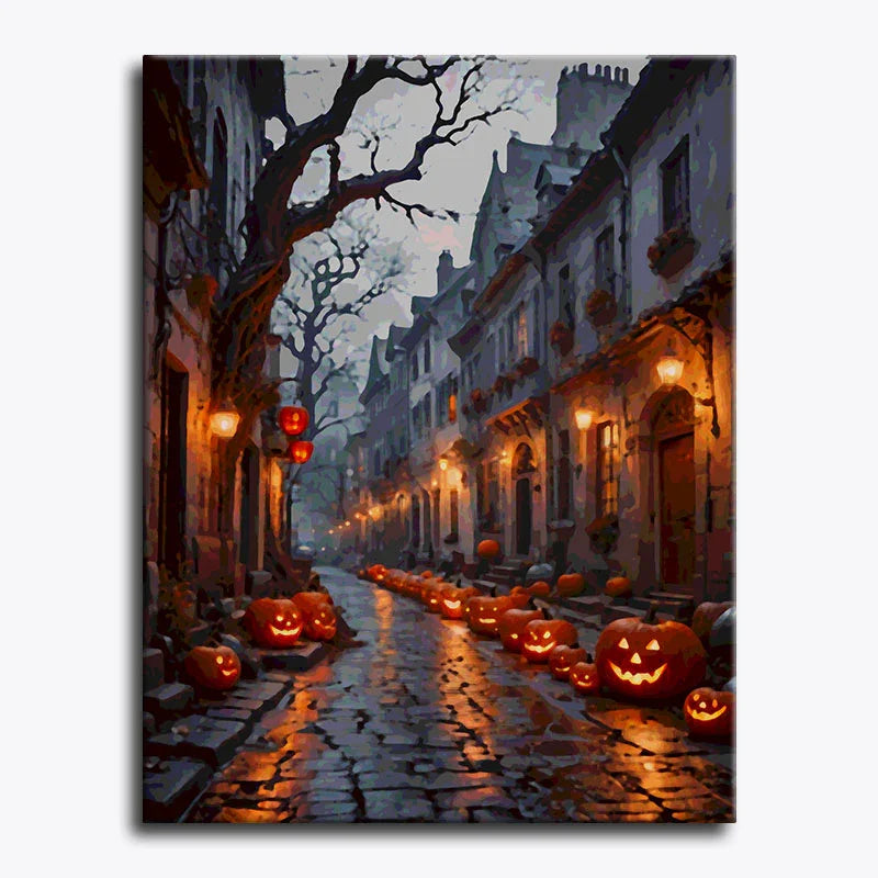 Halloween-themed street scene with pumpkins and lanterns on a cobblestone street.