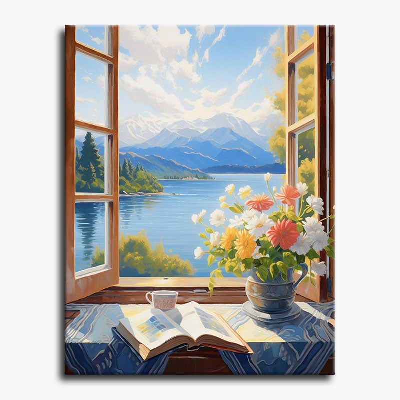 Painting of an open window with a view of a lake and mountains, flowers, and a book on a table.