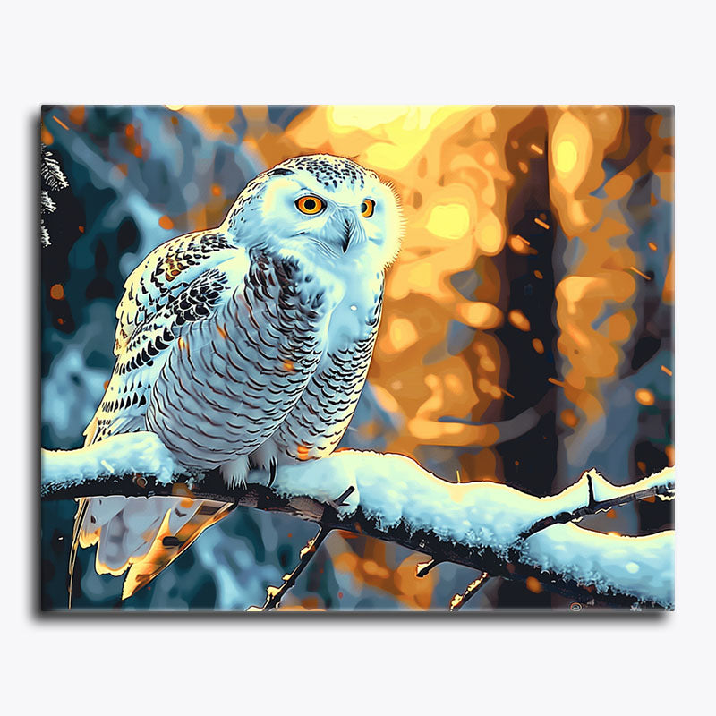 Owl perched on a branch with a colorful background