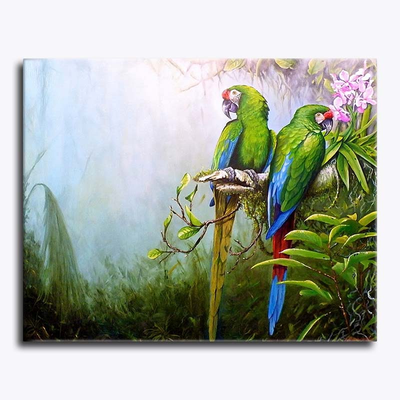 Two vibrant green parrots perched on a rainforest branch with misty foliage – paint by numbers canvas.